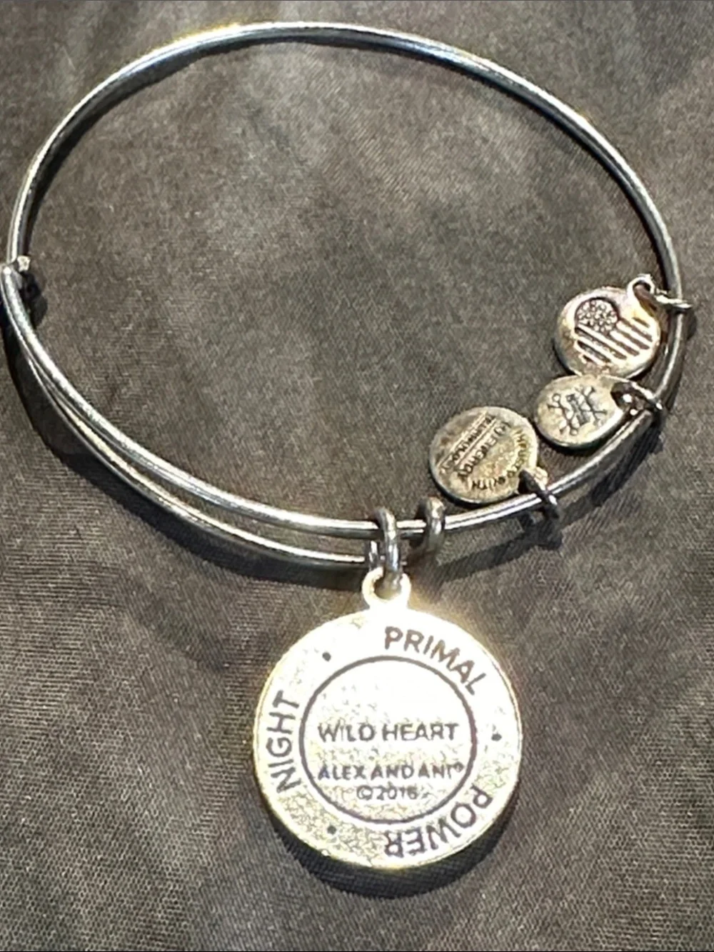 Alex and Ani Wild Heart Cat pendant charm on bracelet